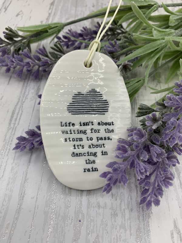 Dancing in the rain porcelain hanging oval plaque
